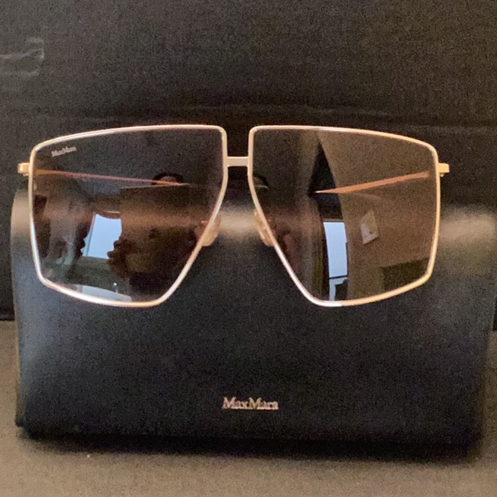 MaxMara gold sunglasses.